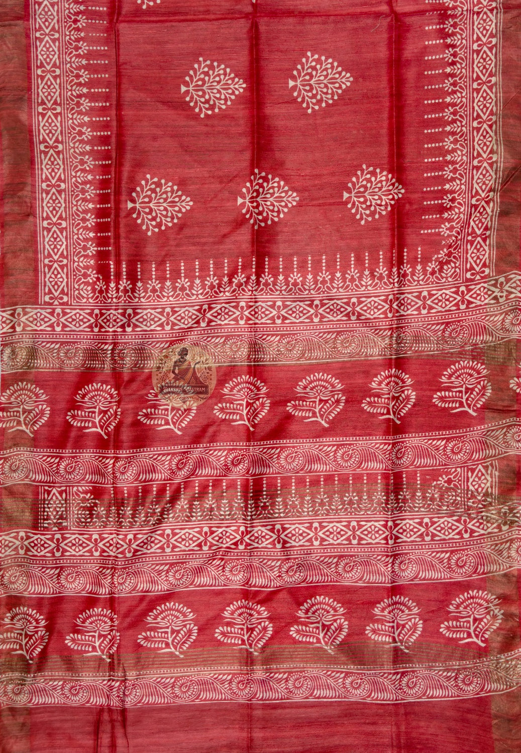 Full saree view of red Ghicha Tussar silk saree with floral motifs and patterned borders