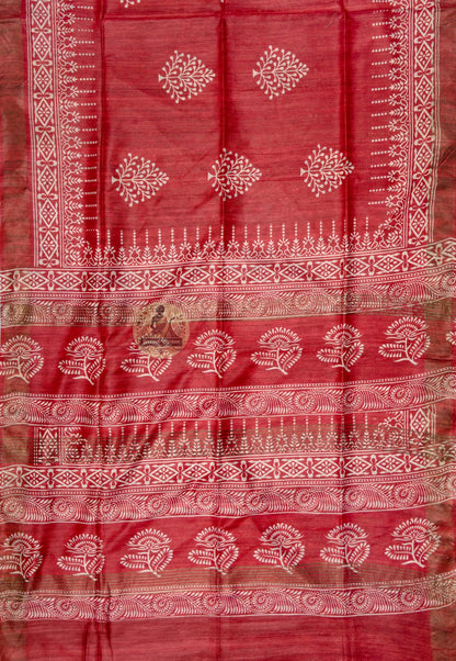 Full saree view of red Ghicha Tussar silk saree with floral motifs and patterned borders