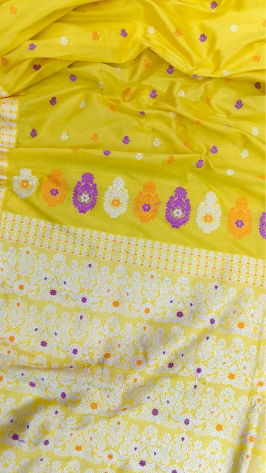 Front view of Assam Mulberry Silk Saree with hand thread work, draped on model in traditional style, showcasing rich silk lustre and intricate embroidery
