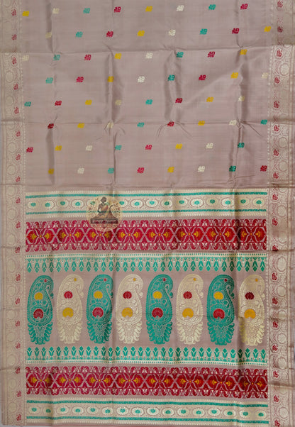 Full saree view of beige Baluchari silk saree with multicoloured motifs and a decorative pallu