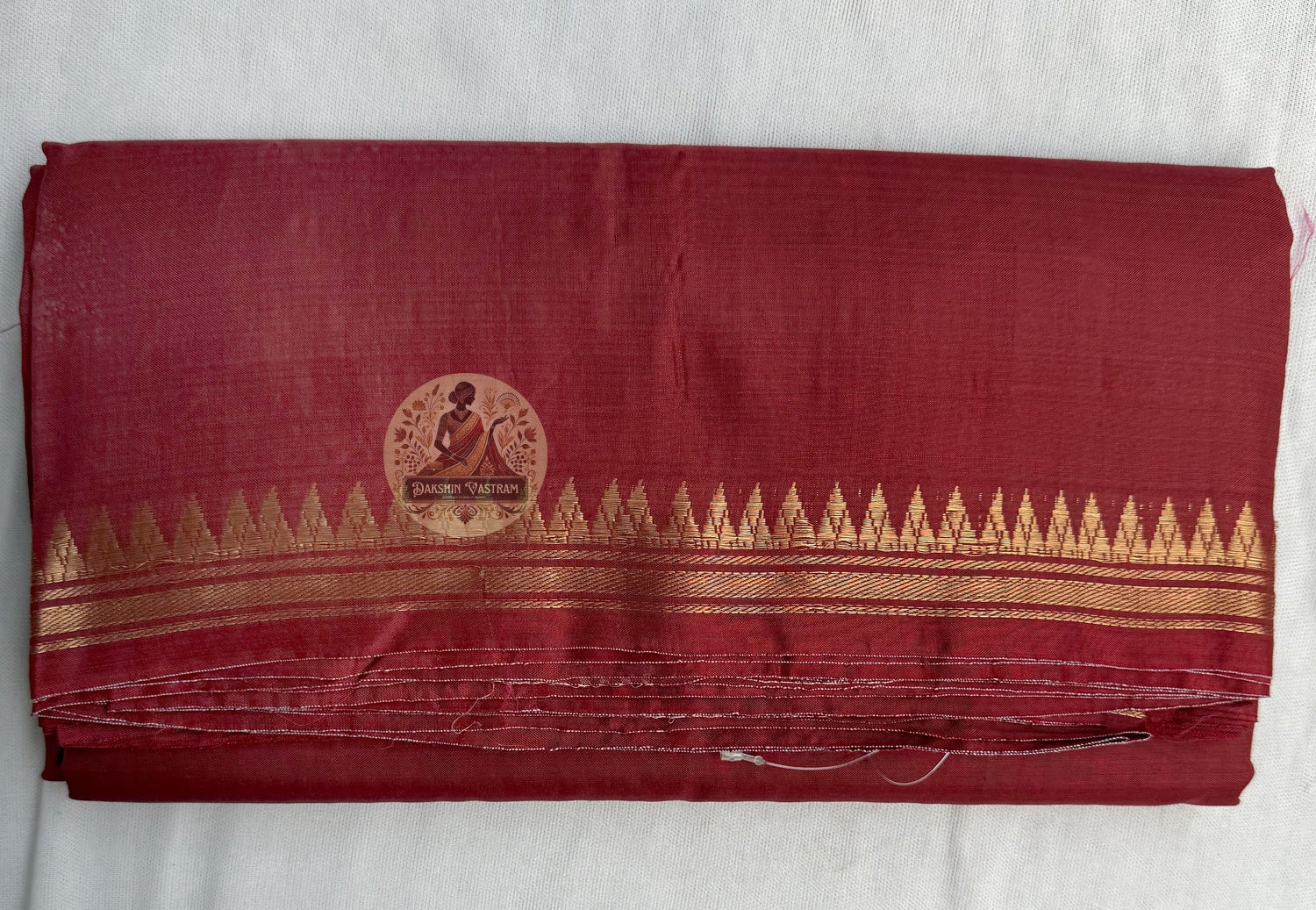 Full flat lay of Bishnupur Pure Katan Silk saree with heritage motifs showing complete drape and blouse piece