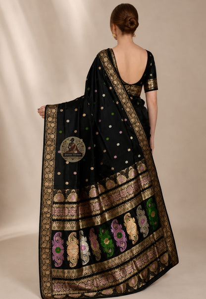 Front view of woman in premium Swarnachari pure silk saree, traditional Bengali drape with golden zari pallu crossing the threshold from Bengal's craft into the occasion over left shoulder