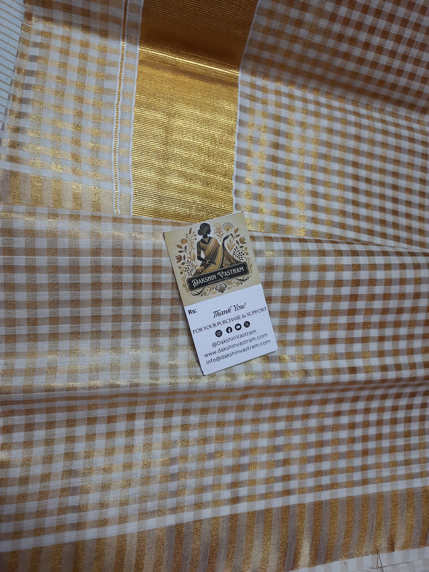 Tissue Small Checked Saree | This beautiful saree is made from 100% organic silk and features a small checked pattern.