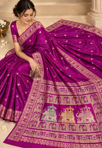 Rear view of magenta Swarnachari silk saree with the decorative pallu draped over the shoulder