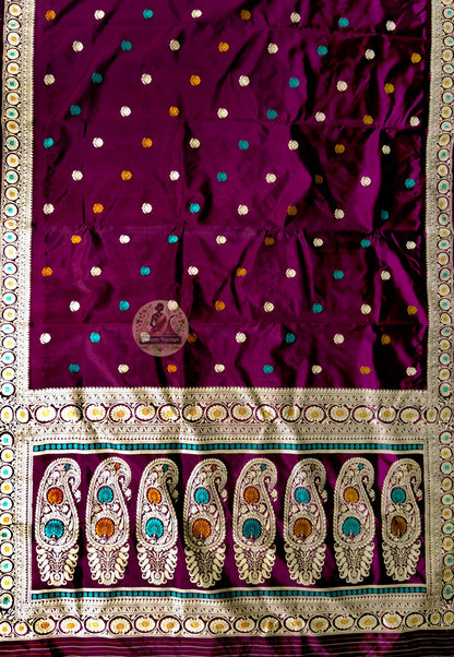 Close-up of pallu of heirloom Bishnupur Baluchari saree showing dense mythological motifs and geometric border by Bankura master weaver