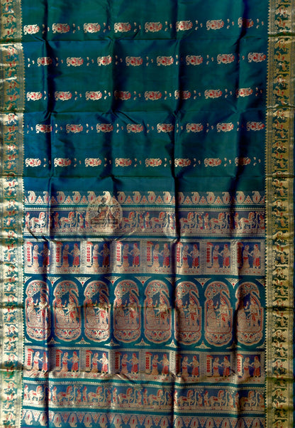 Close-up of Swarnachari silk saree weave showing pure golden zari thread woven directly into silk forming mythological motifs in Bengali handloom tradition