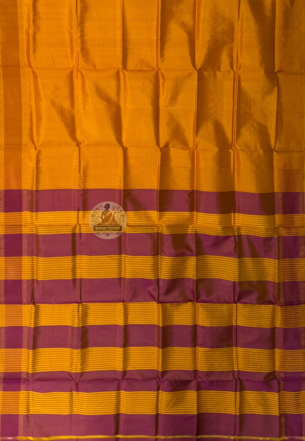 Close-up of pure Katan silk weave texture on Bishnupur handloom saree from West Bengal