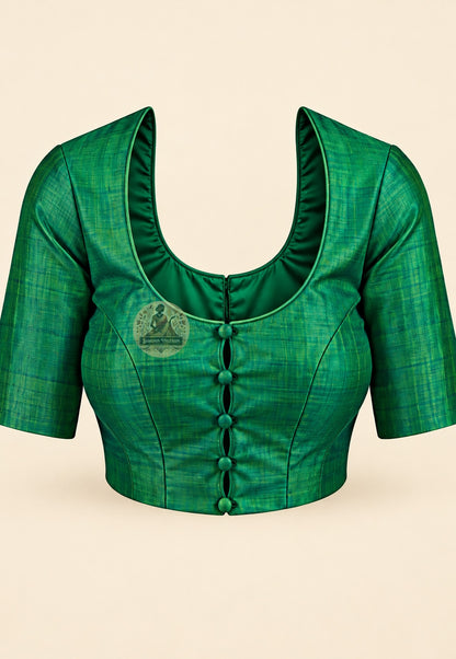 Blouse paired with emerald green Bishnupur silk saree in a matching green shade
