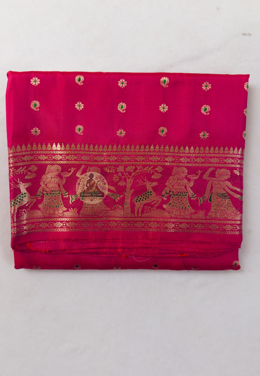 Close-up of Swarnachari silk saree weave showing golden zari Ramayana figures Malla court motifs and Bishnupur temple art patterns formed one thread at a time on pure silk ground