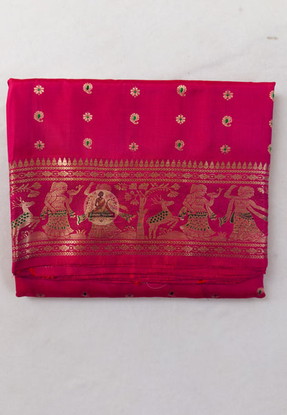 Close-up of Swarnachari silk saree weave showing golden zari Ramayana figures Malla court motifs and Bishnupur temple art patterns formed one thread at a time on pure silk ground