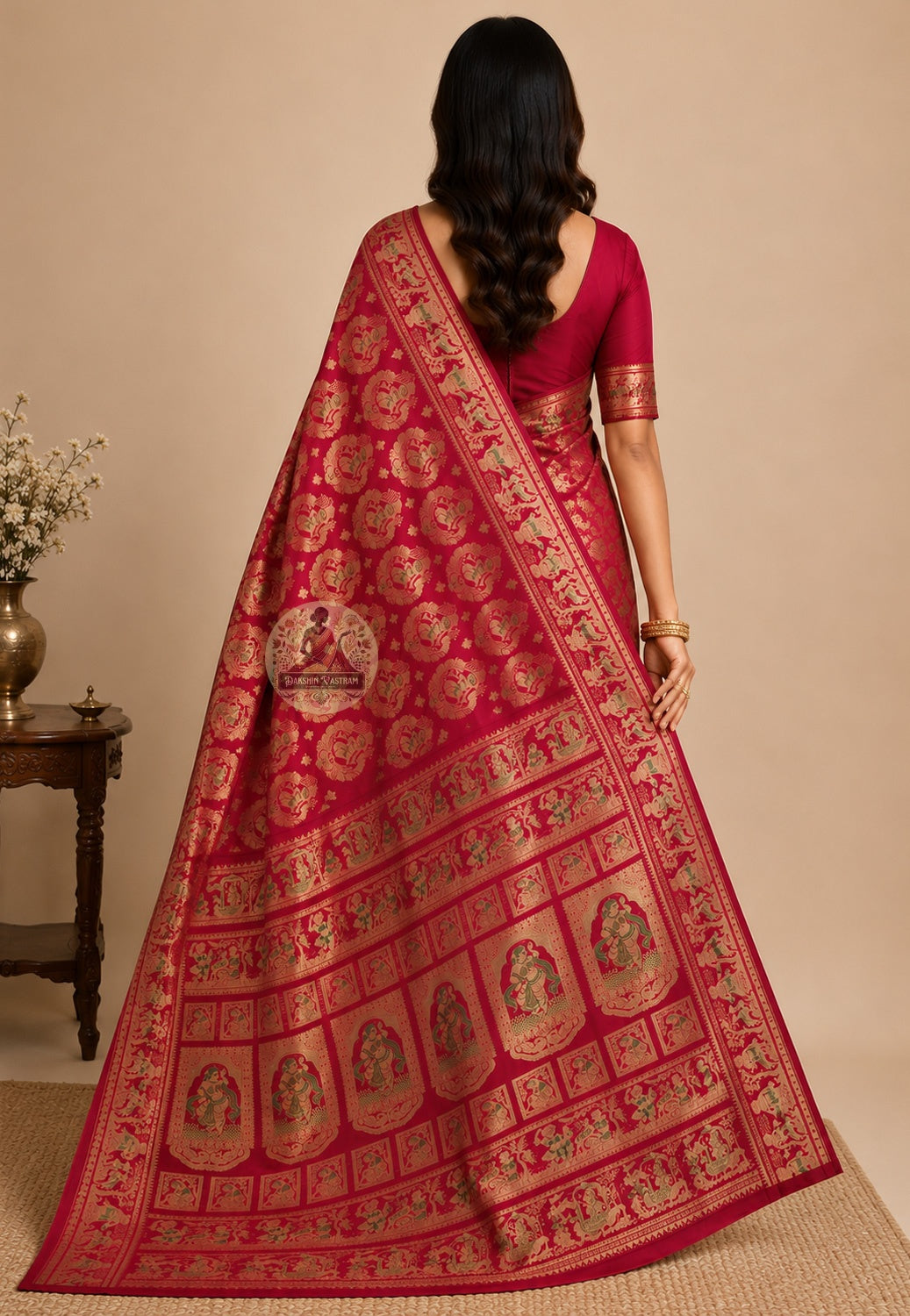 Rear view of Swarnachari silk saree displaying intricate zari pallu with mythological motifs, handwoven Bengal