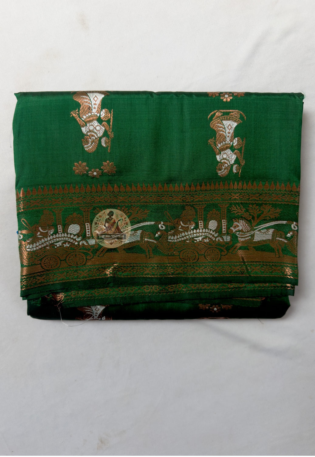Close-up of pallu of Swarnachari pure silk saree showing Ramayana and Bishnupur temple art golden zari narrative composition woven thread by thread on West Bengal handloom