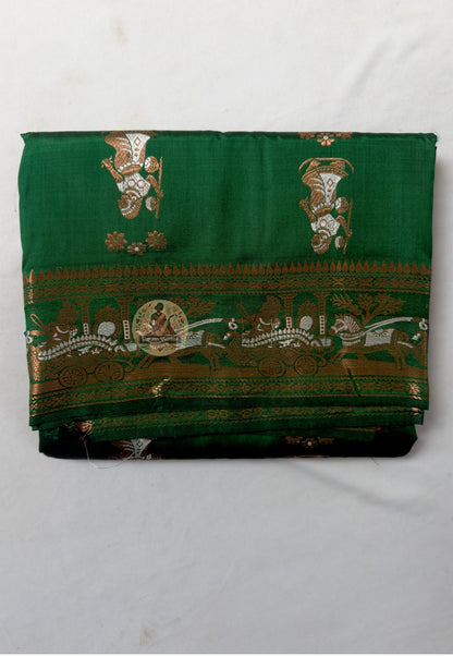 Close-up of pallu of Swarnachari pure silk saree showing Ramayana and Bishnupur temple art golden zari narrative composition woven thread by thread on West Bengal handloom