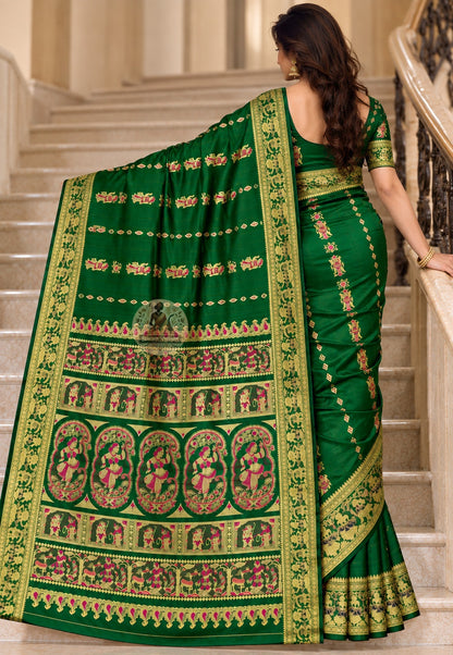 Side view of emerald green Baluchari silk saree showing the drape and broad decorative border