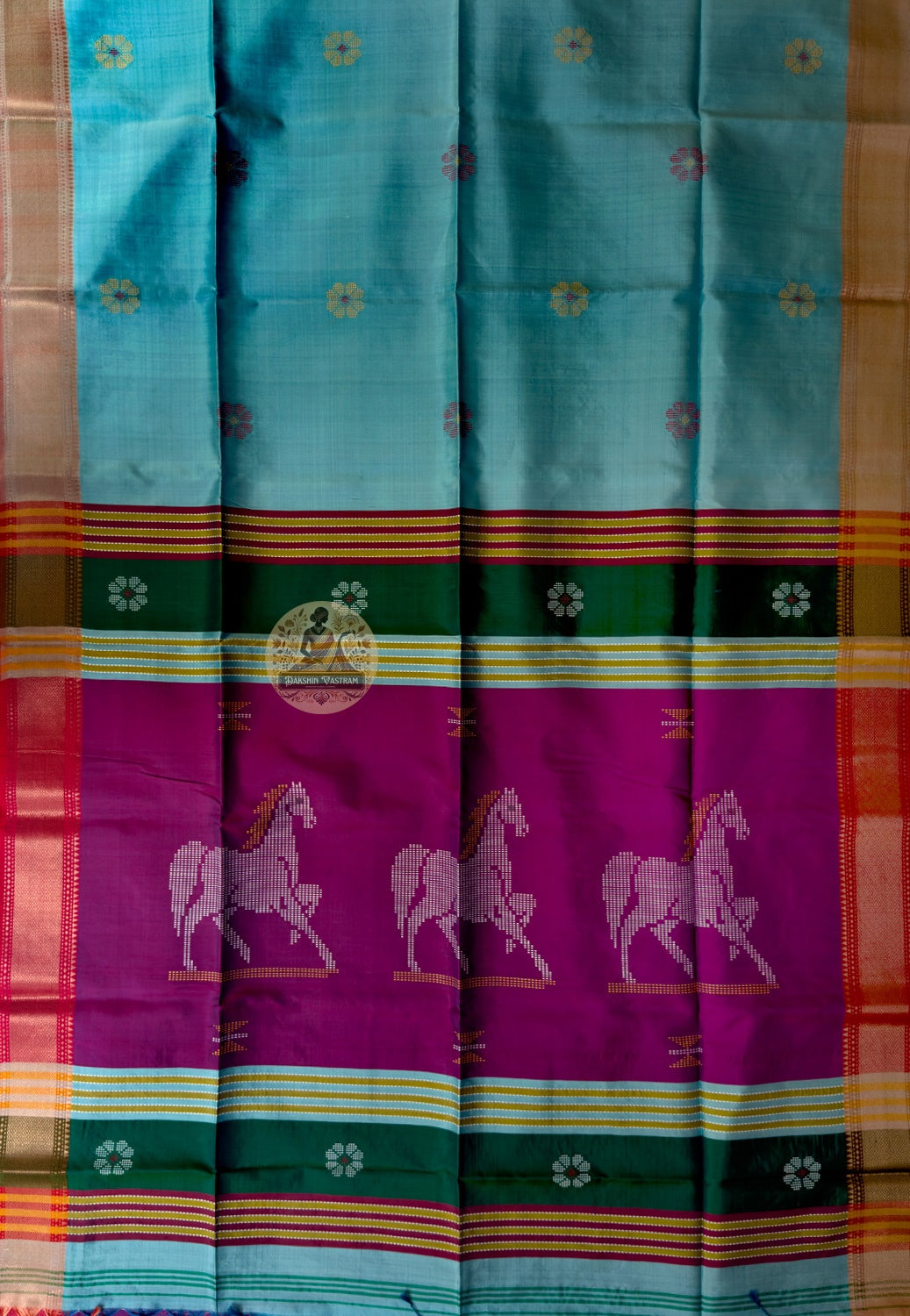 Close-up of handwoven ribbon weave stripe with zari chameli jasmine buti detail on Bishnupur Katan Silk Saree border