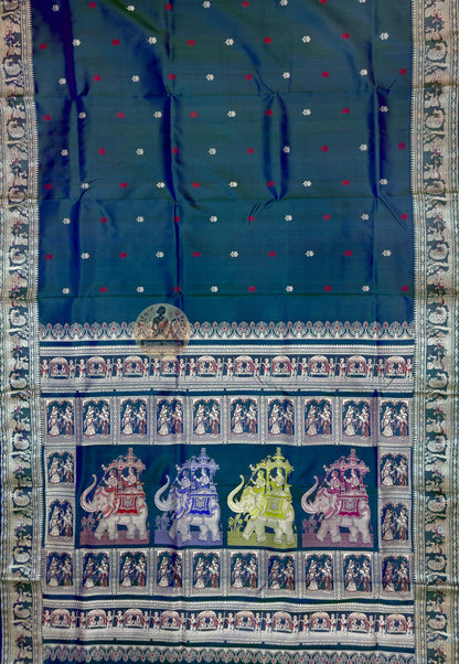 Close-up of Baluchari silk saree pallu showing individually woven Ramayana mythology figures and Malla court compositions in coloured silk thread visible only to those who look closely enough