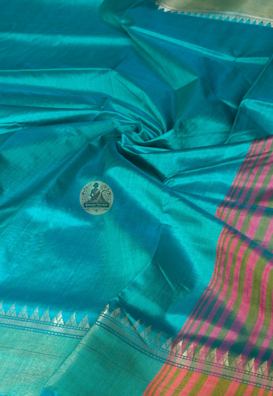 Close-up of handwoven butis (repeating woven motifs) on Bishnupur Katan Silk Saree border

