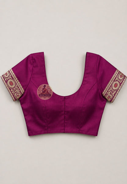 Close-up of blouse piece of premium Baluchari Silk Saree featuring hand-woven traditional border patterns in fine pure Bengal silk, part of Dakshin Vastram Durga Puja Collection 2026 — worn at moments of great significance