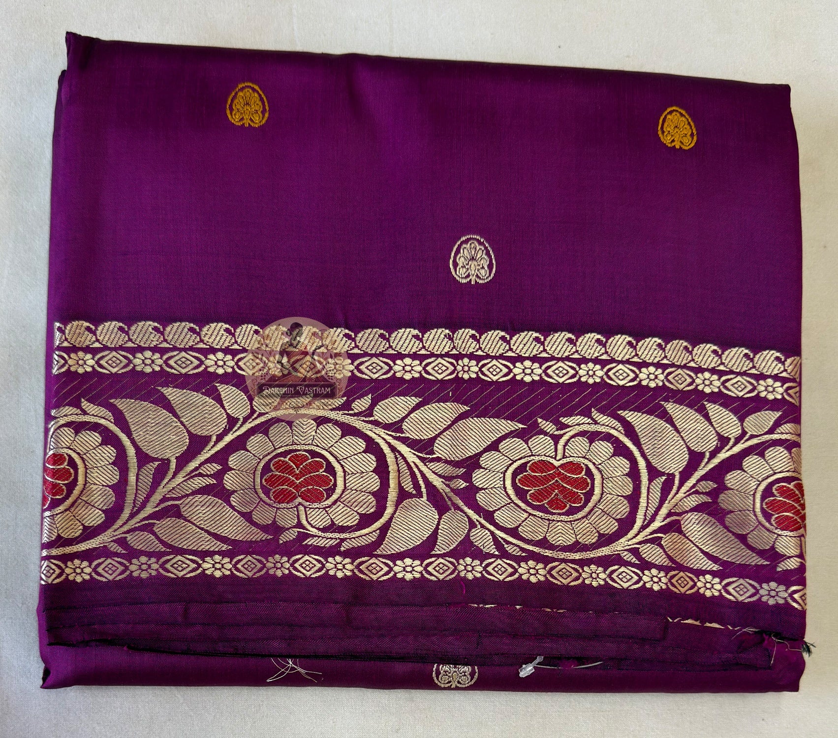 Detail view of traditional Baluchari buti motifs handwoven across the body of Baluchari Pure Silk Saree, revealing the fine weave precision and natural silk lustre of Bengal's three-hundred-year narrative textile tradition