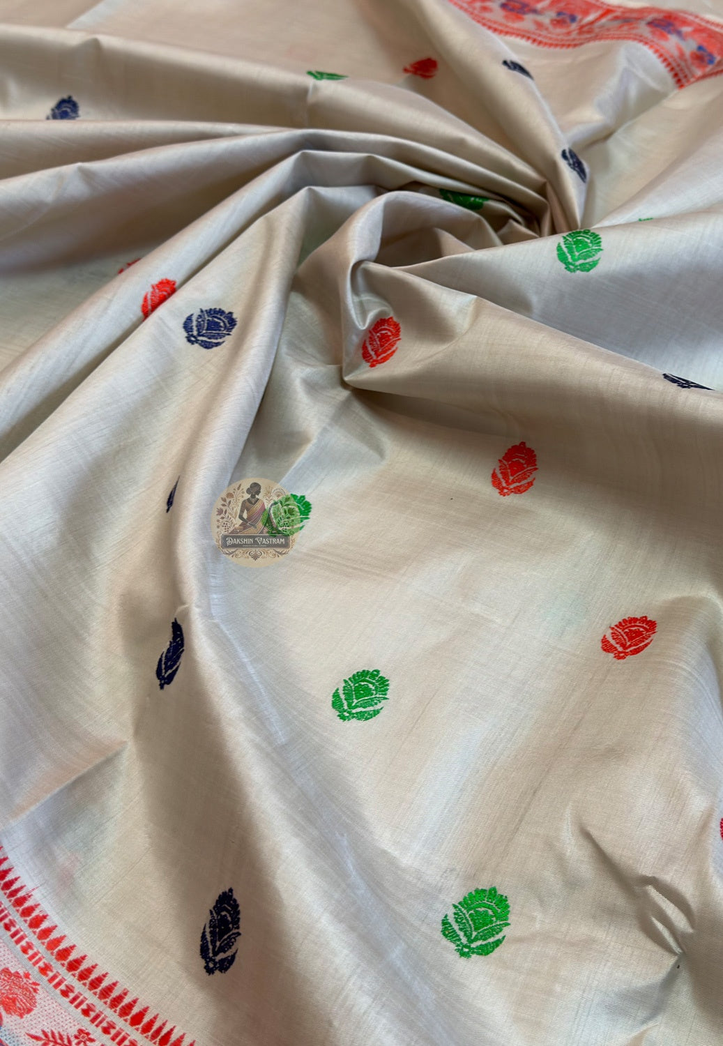 Detailed close-up of hand-woven border on premium Baluchari Silk Saree showing intricate Bishnupur weave patterns and fine pure silk thread craftsmanship passed down across centuries