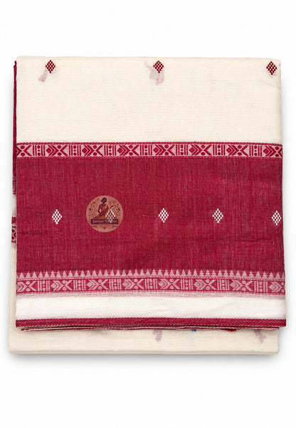 Close-up of woven border detail on Bengali handloom cotton saree showing artisan finish