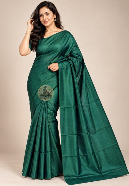 Front view of deep green Bishnupur handloom silk saree with a plain body and lustrous folds