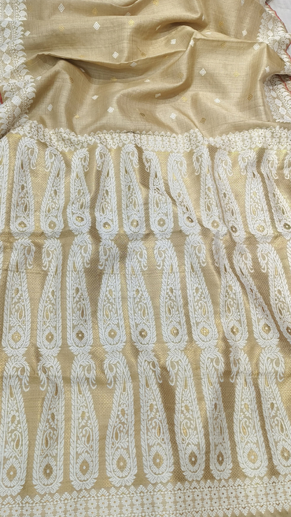 Rear view of Assam handloom Muga silk saree highlighting its golden-beige fabric and diamond motifs.