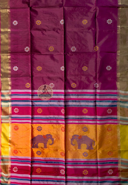Close-up of Bishnupur Katan silk festival saree weave showing traditional Bengal buti motifs and structured pure silk surface formed directly in the pit loom handloom weave