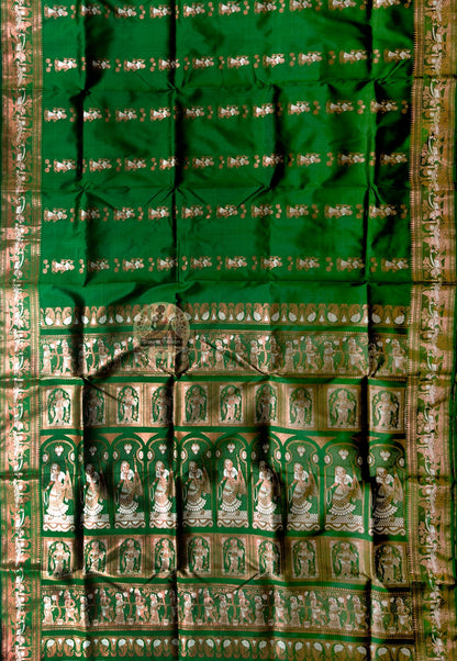 Side view of Swarnachari handloom silk saree showing fine golden zari detail border and naturally warm pure silk drape, West Bengal pit-loom weave