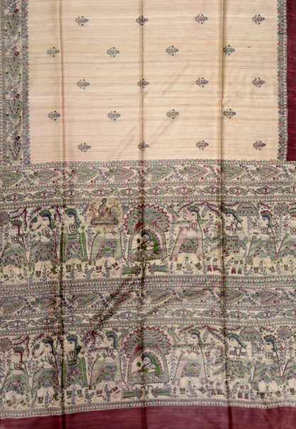 Full saree view of beige Ghicha Tussar silk saree with maroon edges and an intricately patterned pallu