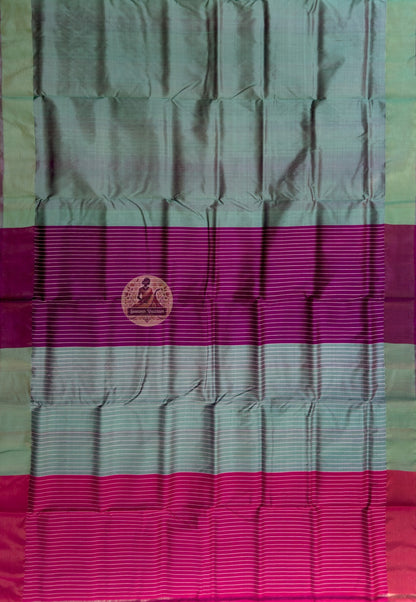 Detailed close-up of hand-woven border on Bishnupur Pure Katan Silk Saree showing the warm natural lustre of pure Katan silk and Bishnupur weave patterns that glow with the confidence of something that knows its own worth