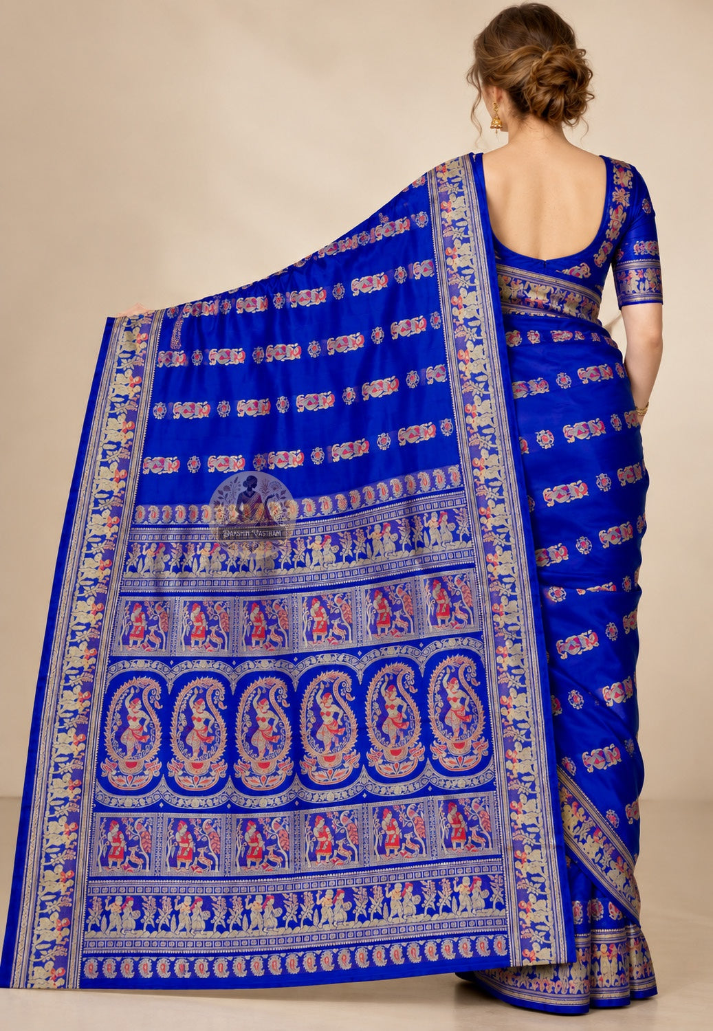 Side view of royal blue Baluchari silk saree showing the drape and contrasting patterned border