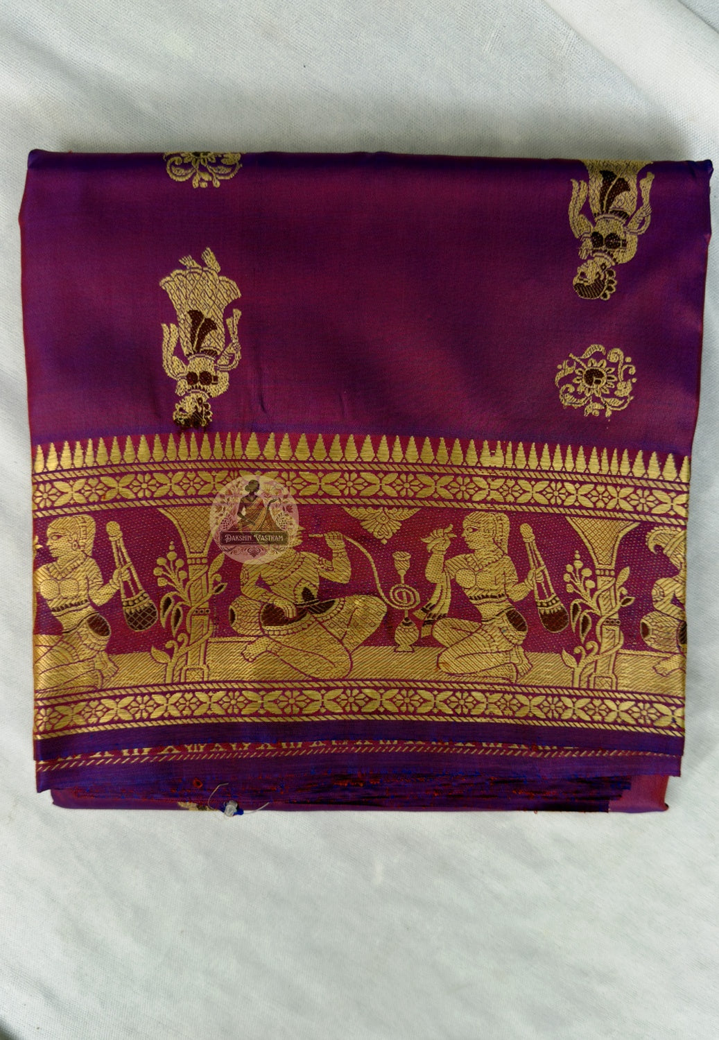 Close-up of celestial court vignette and butis woven into border of Baluchari Silk Saree, traditional Bengal handloom