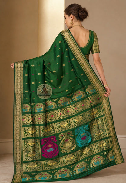 Front view of woman in Swarnachari pure silk saree, traditional Bengali drape with golden zari pallu carrying what Bengal's weaving tradition has witnessed over left shoulder