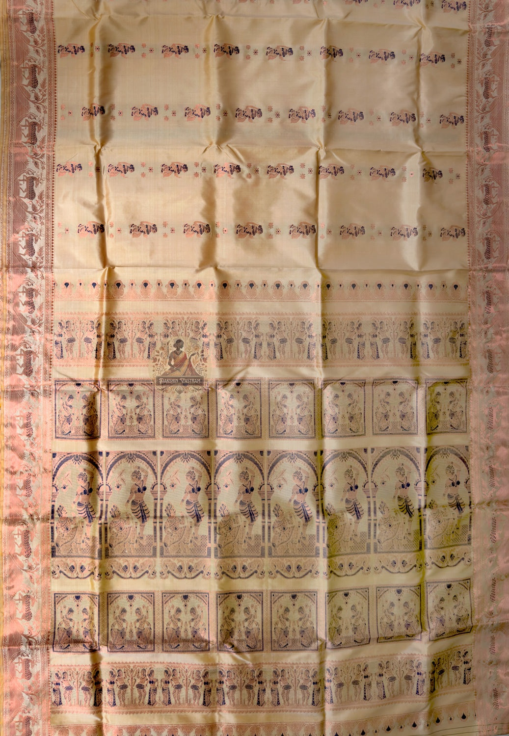 Side view of Bishnupur Swarnachari handloom silk saree displaying elegant drape and golden zari glow on cream pure silk