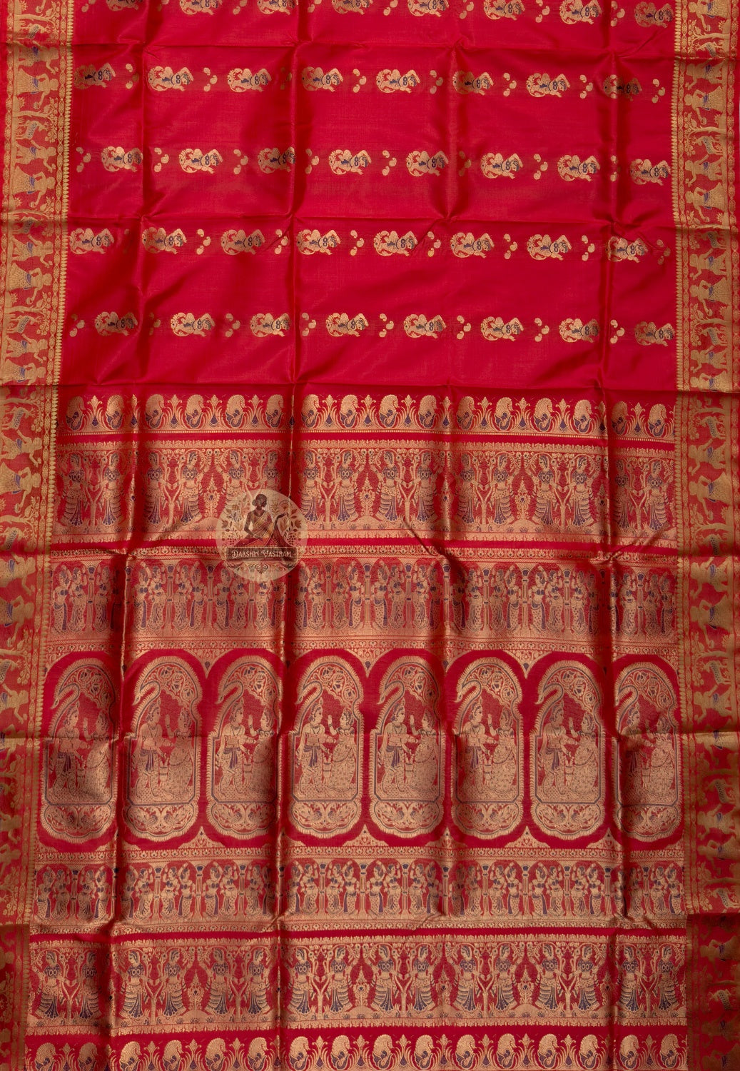 Side view of Swarnachari handloom silk saree showing golden zari border proportion and warm pure silk drape, West Bengal pit-loom weave