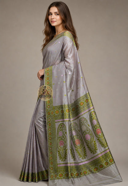 Front view of woman wearing Baluchari Silk Saree with raw silk blouse Indian wedding reception collector saree Kolkata