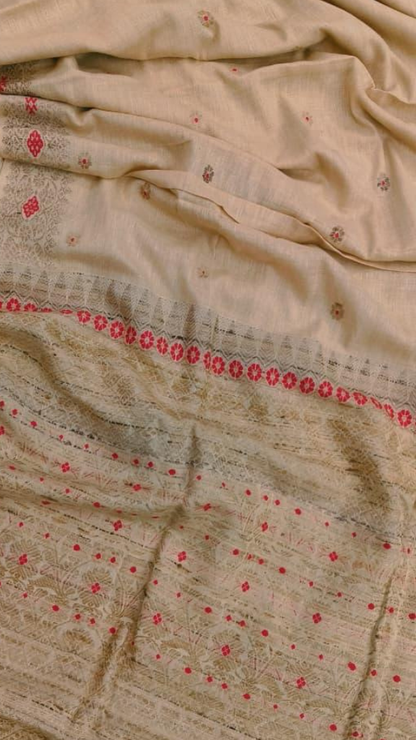 Full-length flat lay of Dakshin Vastram heirloom Eri Silk Saree, handloom Assam silk showing natural weave, matte finish and woven border