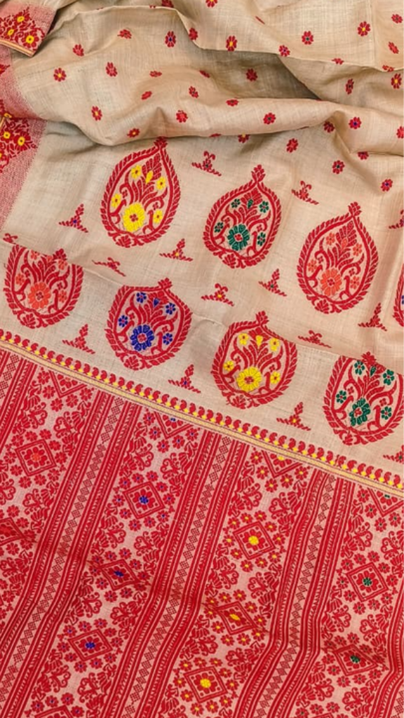 Close-up of running blouse fabric from Pure Muga Silk Saree set, featuring coordinating natural golden Muga silk with handwoven texture and warm lustrous finish