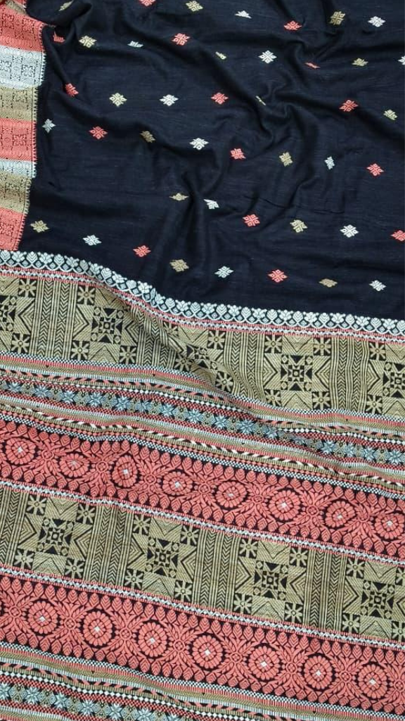 Full-length flat lay of Dakshin Vastram handloom Eri Silk Saree showing natural silk drape, woven border and earthy tones