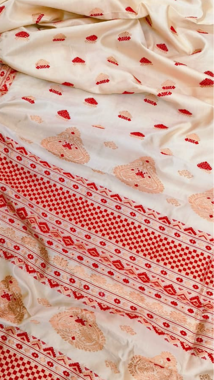 Close-up of running blouse fabric from Assam Mulberry Silk Copper Zari Saree set, featuring matching silk weave with warm copper metallic zari border