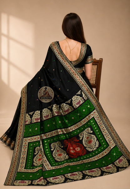 Rear view of Baluchari pure silk saree with traditional motifs and pallu draped over the shoulder