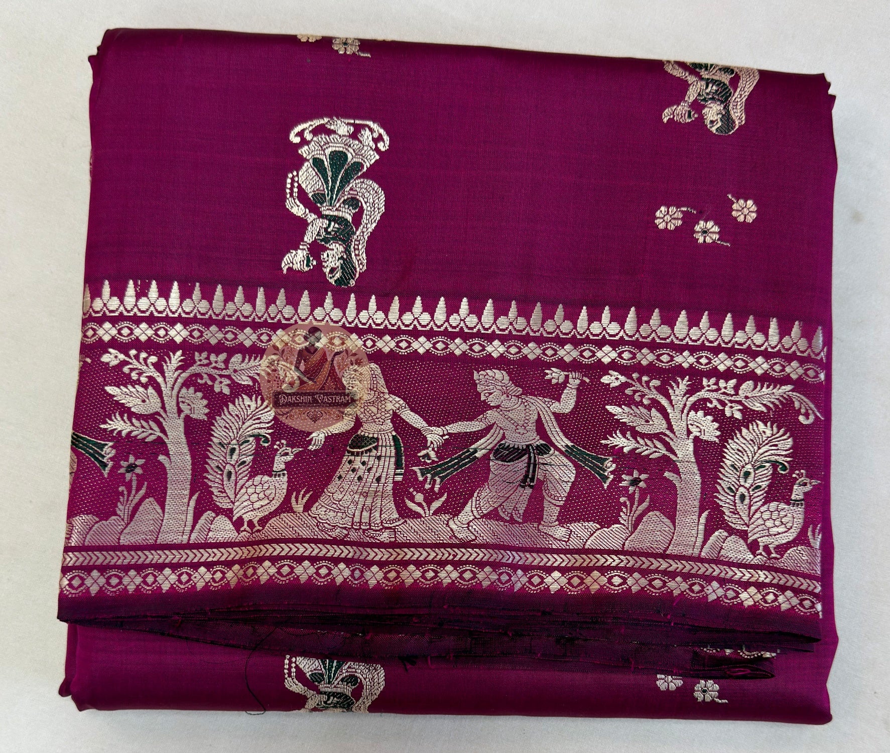 Dakshin Vastram Baluchari silk saree folded showing blouse piece and border