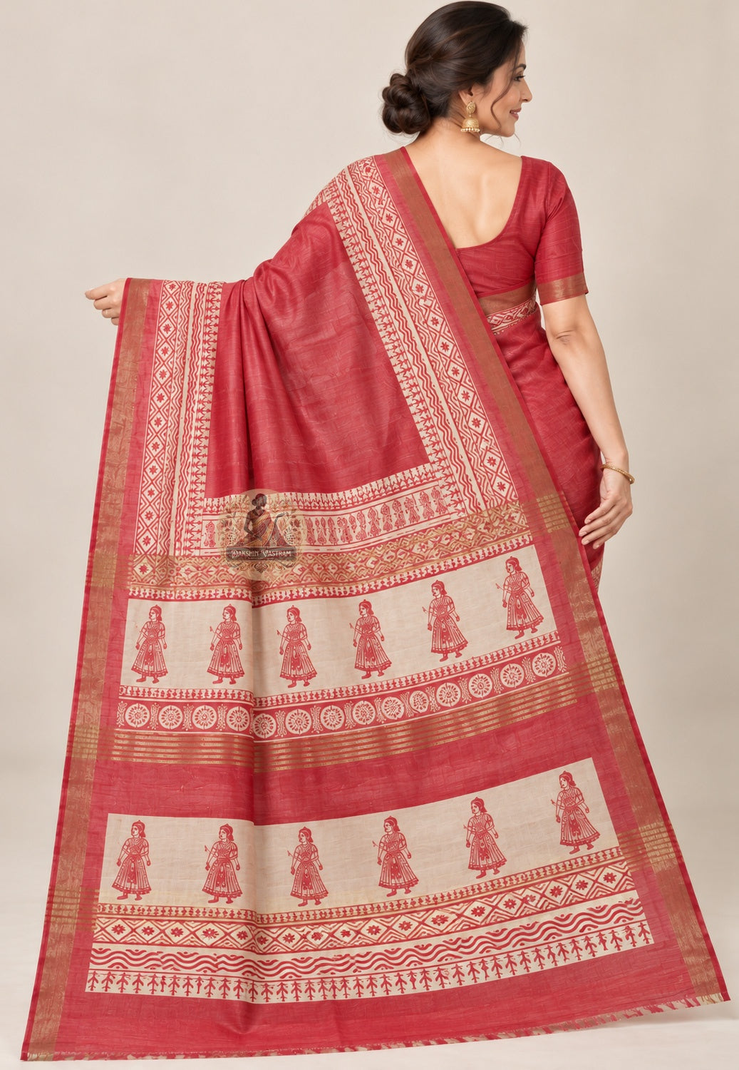Rear view of red Ghicha Tussar silk saree highlighting the decorative pallu over the shoulder