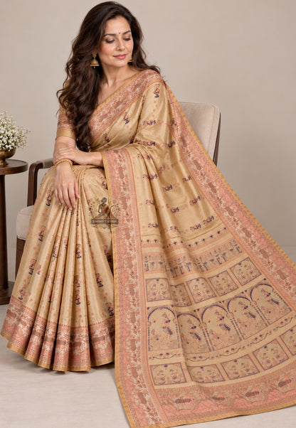 Front view of Swarnachari silk saree showing mythological narrative panels and lustrous zari weave on cream pure silk fabric