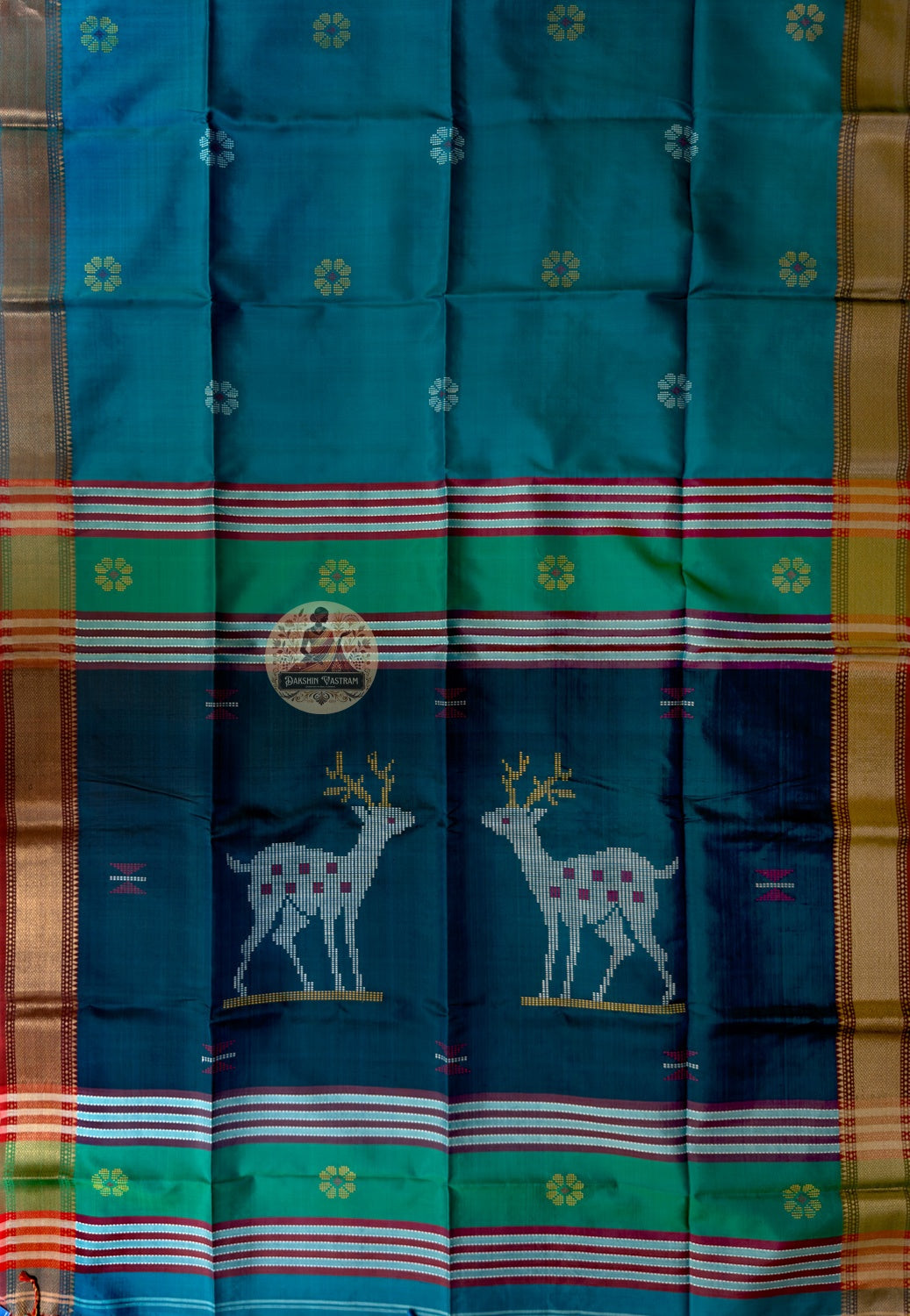 Close-up of master-woven conch shell arch border with zari ashtha mangala buti detail on Bishnupur Katan Silk Saree
