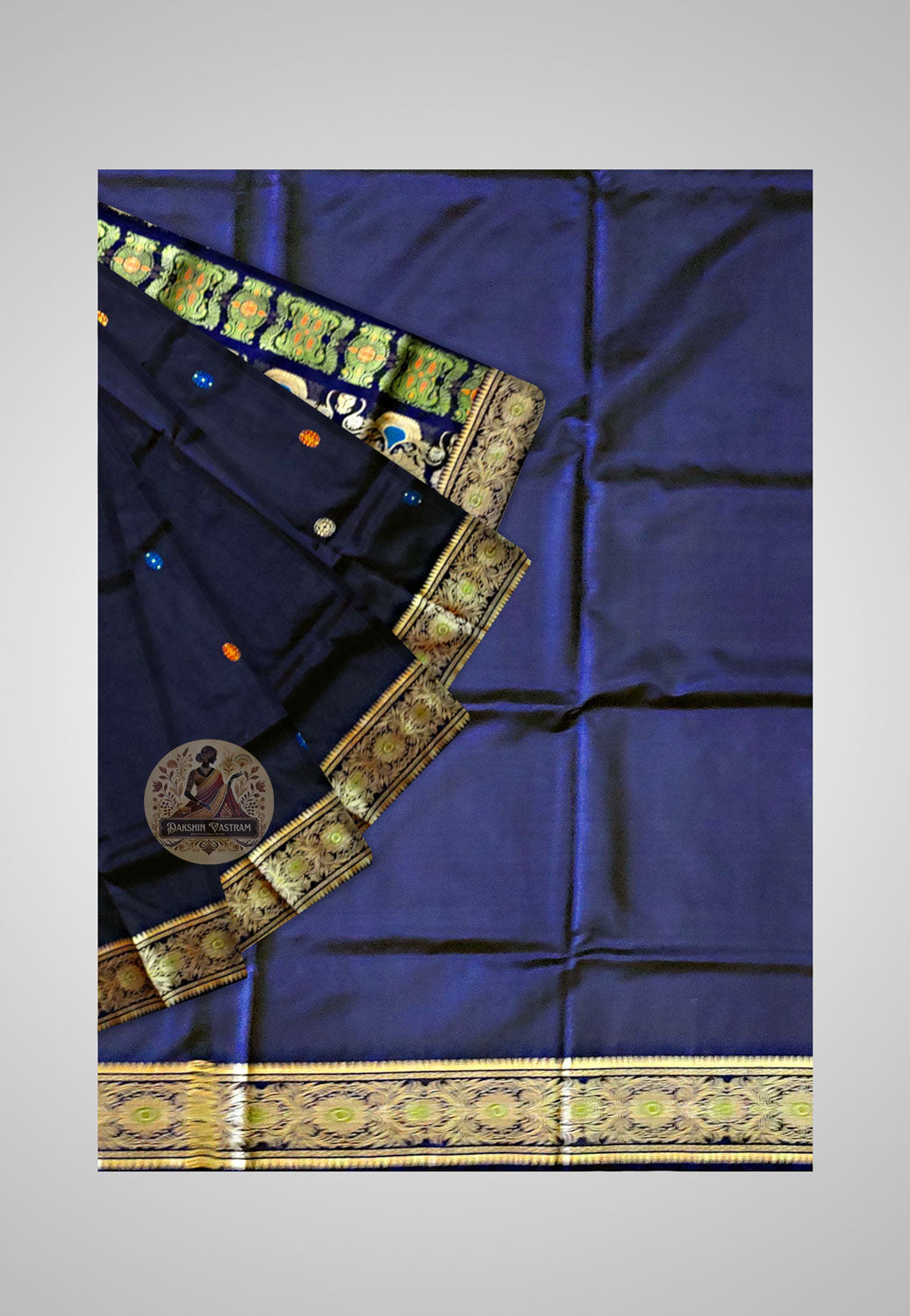 Saree Close-up: Close-up of the handwoven Baluchari motifs and soft silk fabric.