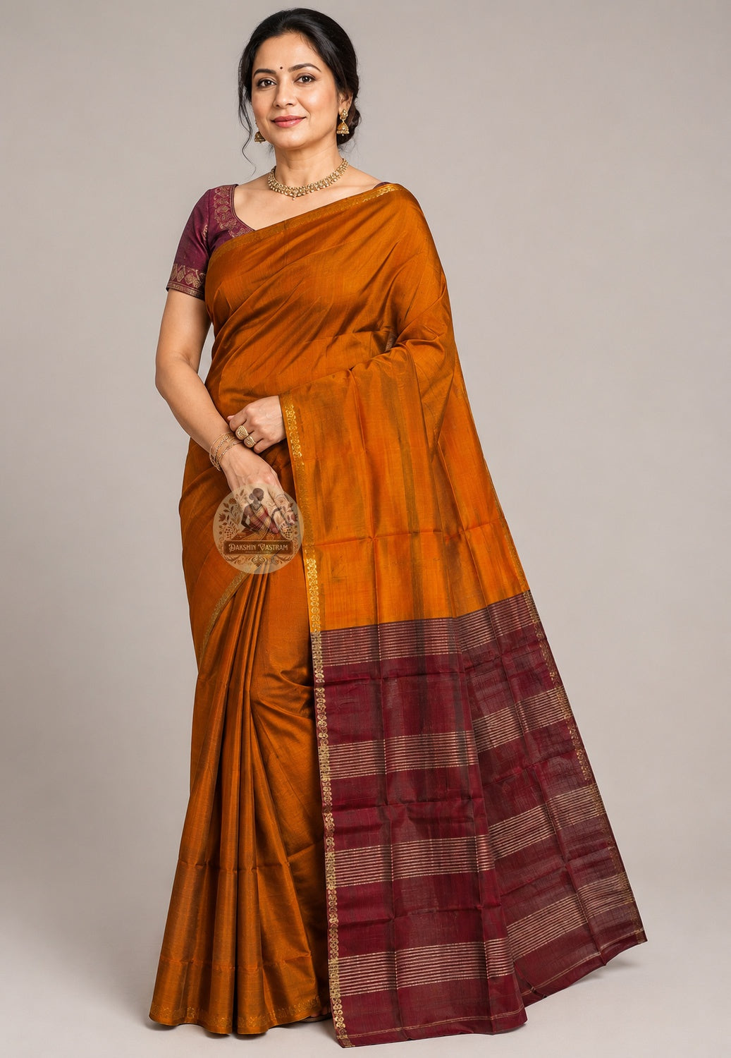 Front view of handwoven Bishnupur Pure Katan Silk Saree from Bengal, part of Durga Puja Collection 2026, showcasing heritage motifs on the pallu and the warm authoritative drape of pure Katan silk that carries a sense of belonging wherever you are