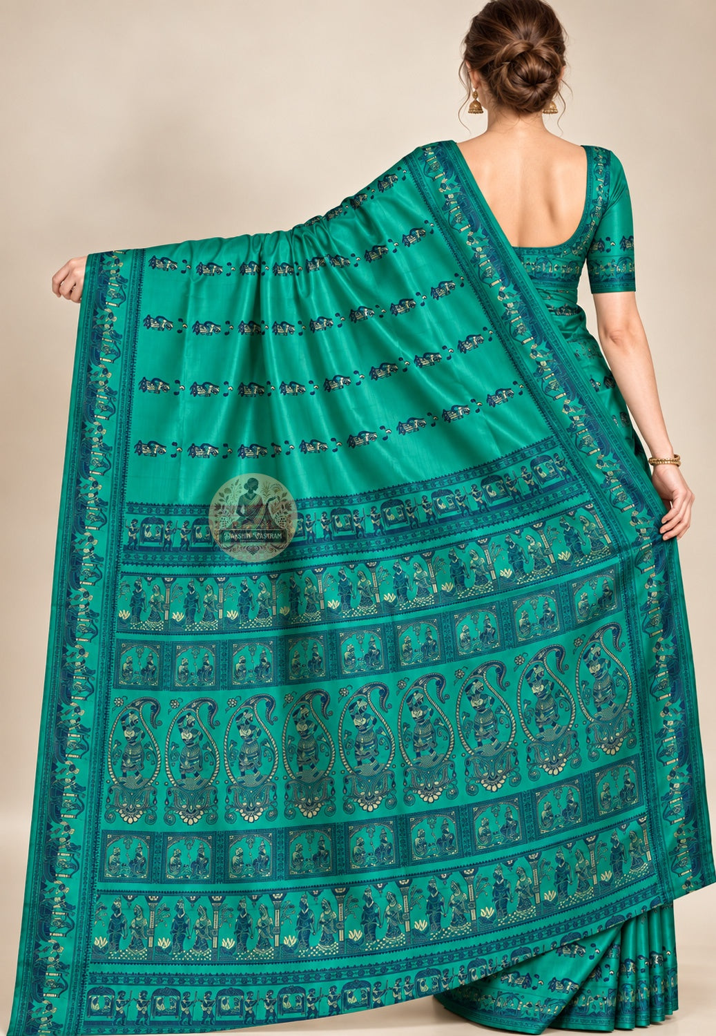 Rear view of green Baluchari silk saree showing the pallu draped over the shoulder