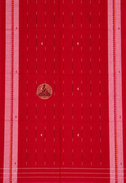 Close-up of handwoven border detail on pure cotton Bengali saree showing weave texture